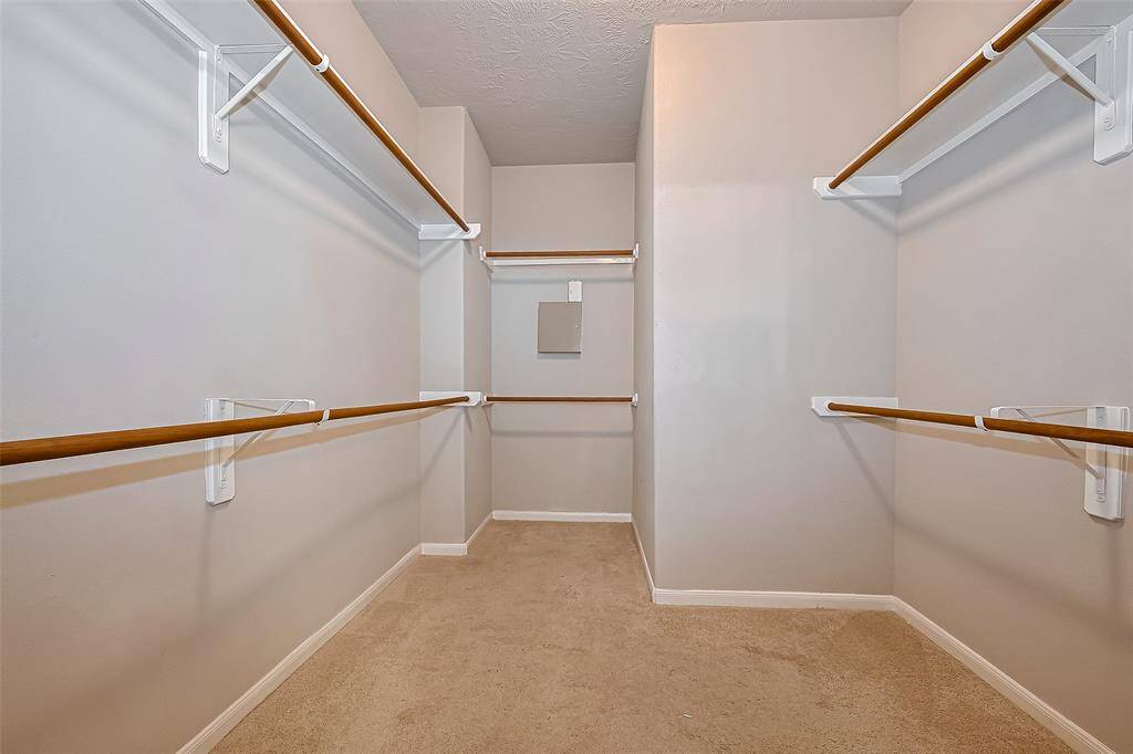 Large primary bedroom closet.
