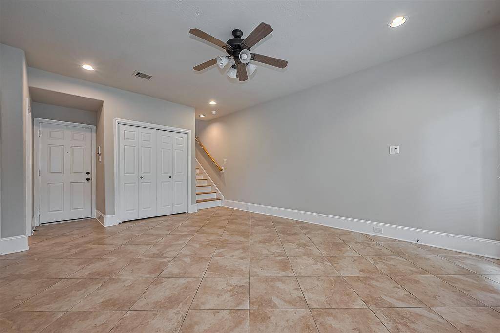 Direct access from the spacious two-car garage leads you into the additional downstairs living room, which includes the utility room.