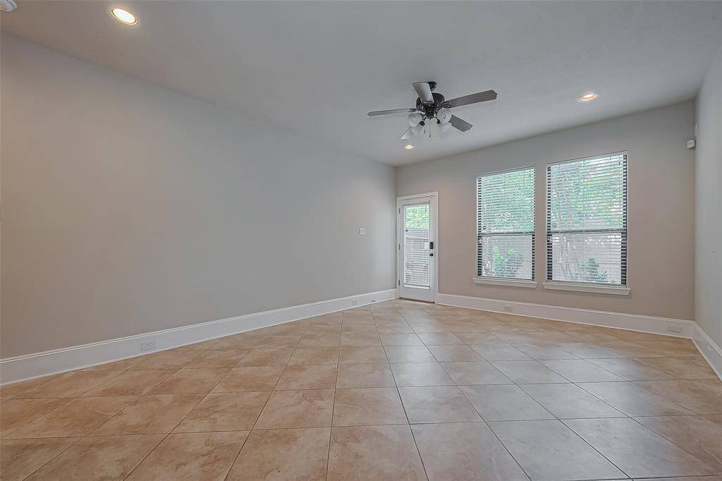 Downstairs living room opens directly to the backyard!