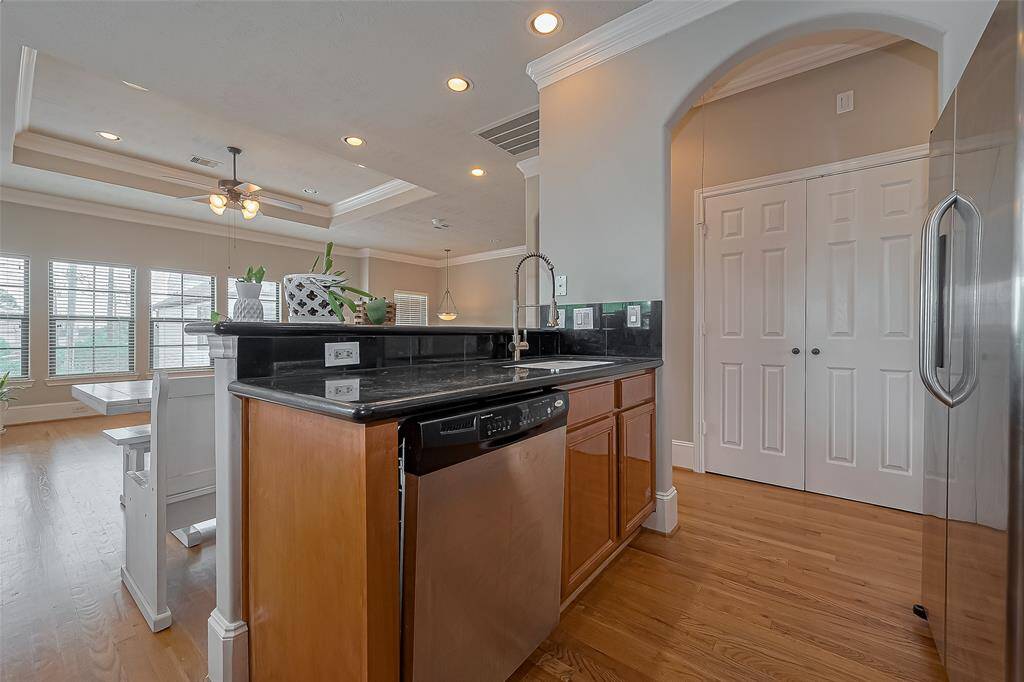 Kitchen opens up nicely to the living room. Additional kitchen updates include newly installed sink and faucet.