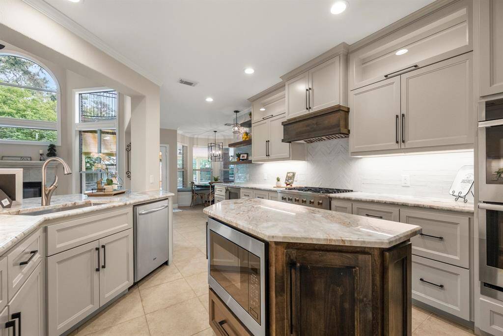 Extensive cabinetry offering lots of storage and counter space that makes for easy entertaining.