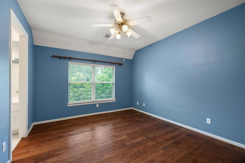 Fourth bedroom has a large window and connects to a Jack and Jill bathroom.