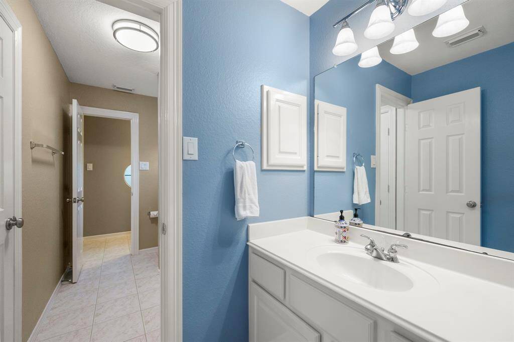 Jack and Jill bathroom connecting fourth and fifth bedrooms.
