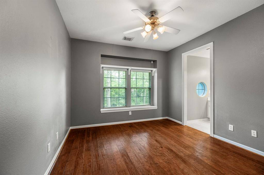 Fifth bedroom with access to vanity area of Jack and Jill bedroom.