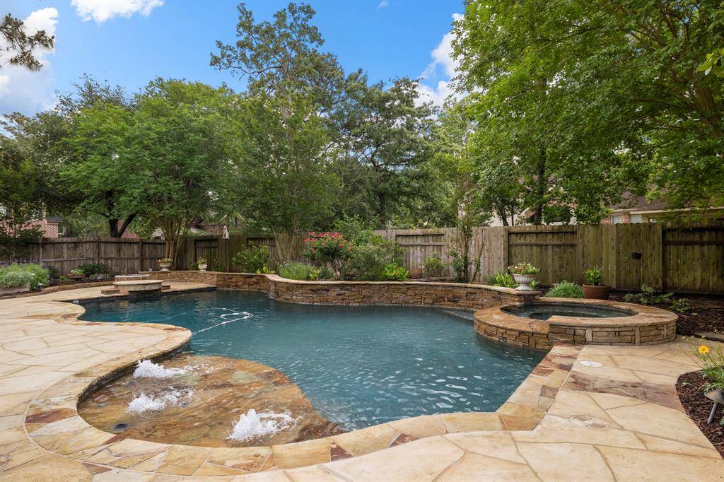 The soothing water features of this pool allow you to enjoy the peace and privacy of your pool with your family and friends.
