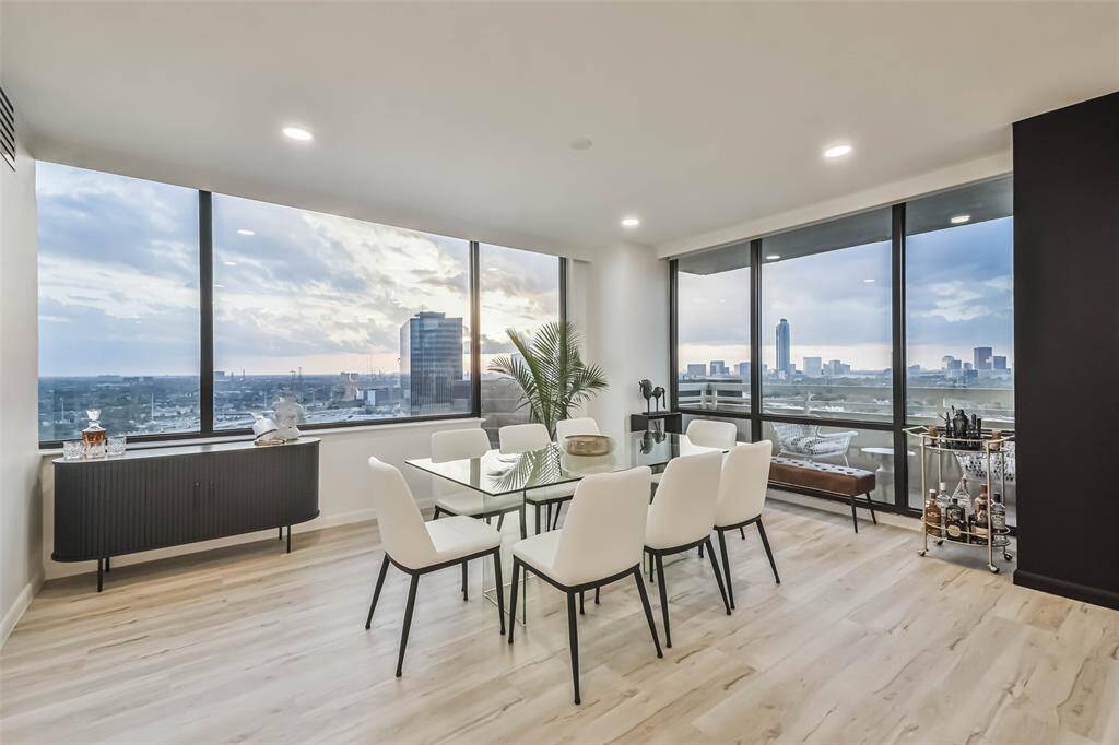 An incredible setting to enjoy a quiet dinner or entertain guests as glorious western views enhance this stylish and totally reimagined highrise home.