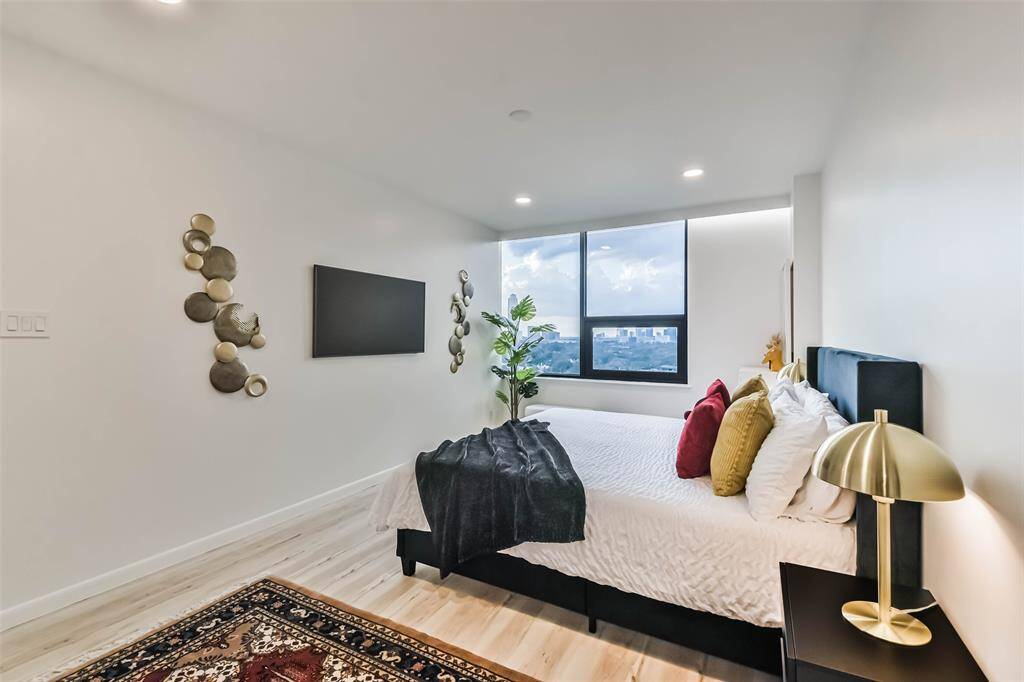 A beautiful and comfortable primary retreat includes a walk-in closet and ensuite bath.