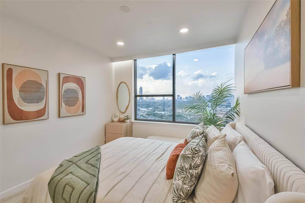 The welcoming secondary bedroom is across the hall from the guest bath.