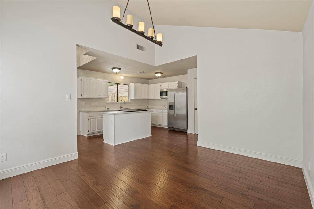 The dining room has immediate access to the kitchen.