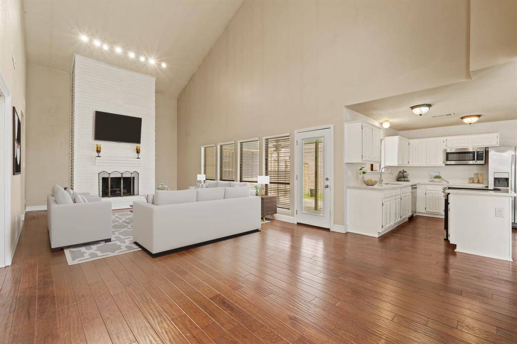 Virtually Staged: Fantastic open layout between the living and kitchen areas. An entertainer's dream!