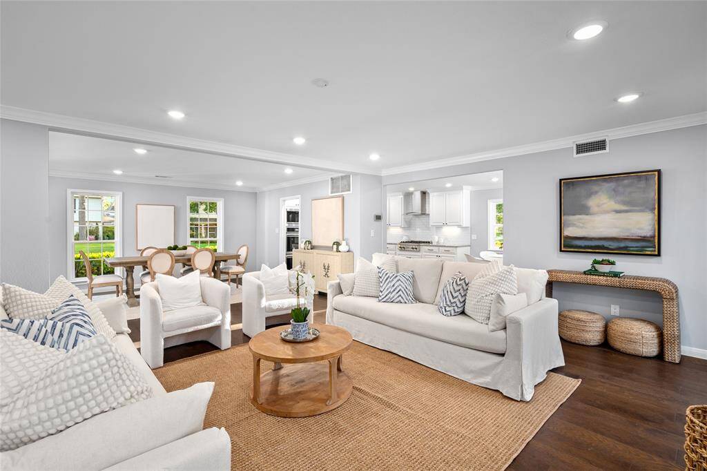 LIVING ROOM- Open concept floor plan. Canned lighting throughout the home.