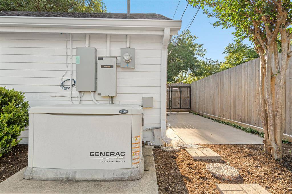 GENERAC GENERATOR - A MUST have in Houston! Take note of the additional concrete parking pad. This is a perfect spot for a weekend car, boat trailer, or golf cart.