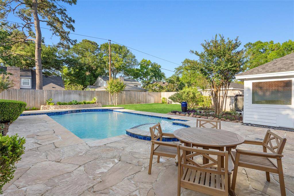 BACKYARD POOL & GREEN SPACE- Enjoy this pool (recently resurfaced per seller), patio, and large green space all year long.
