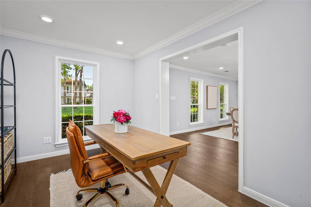 STUDY/FLEX SPACE- Picturesque view of the front yard. Easily make this room private by adding a set of French Doors.