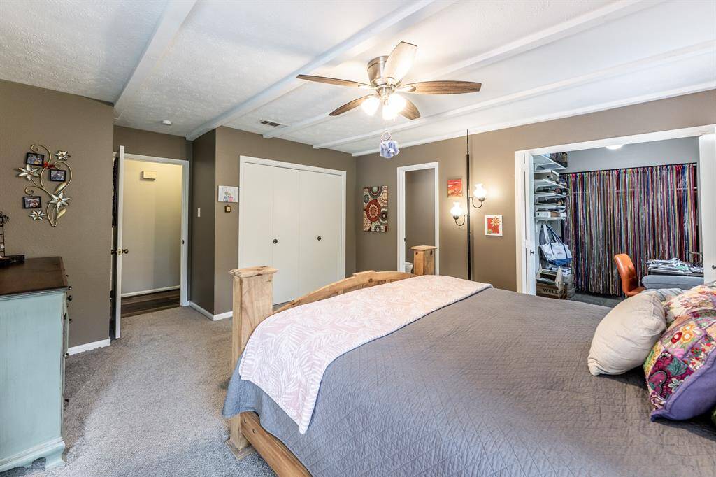 Primary bedroom opposite door.
