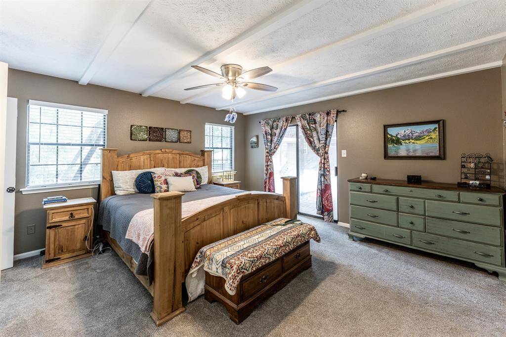 Primary bedroom from by bathroom.