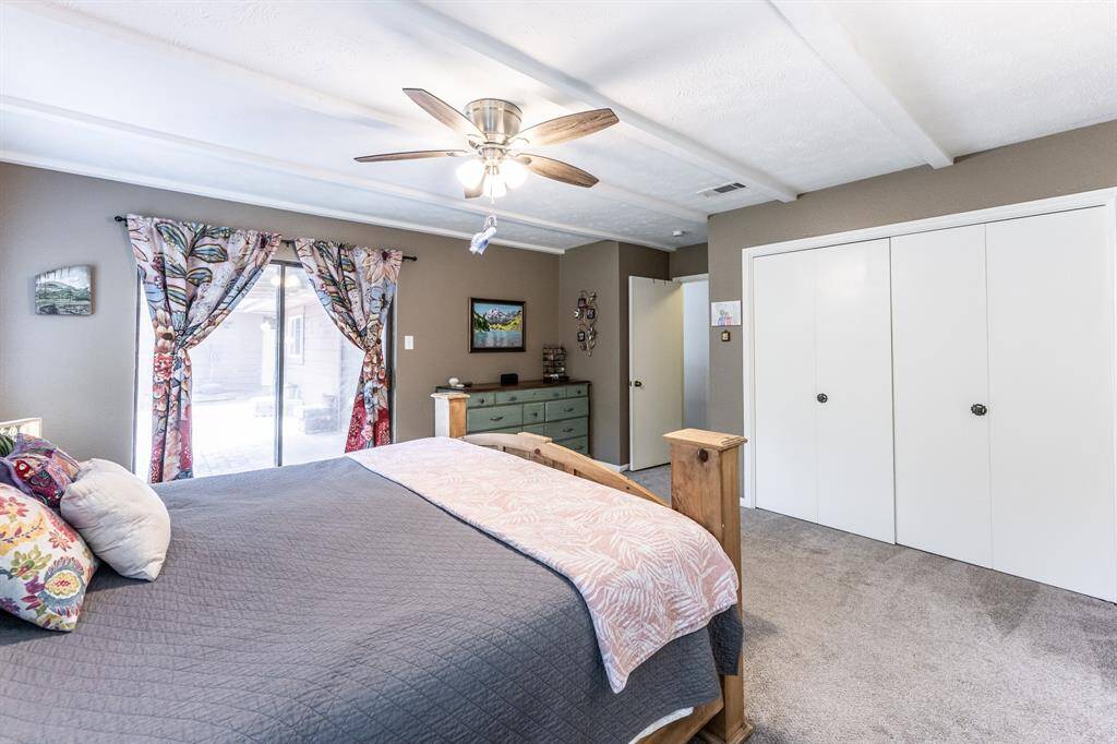 Primary bedroom from sitting area.