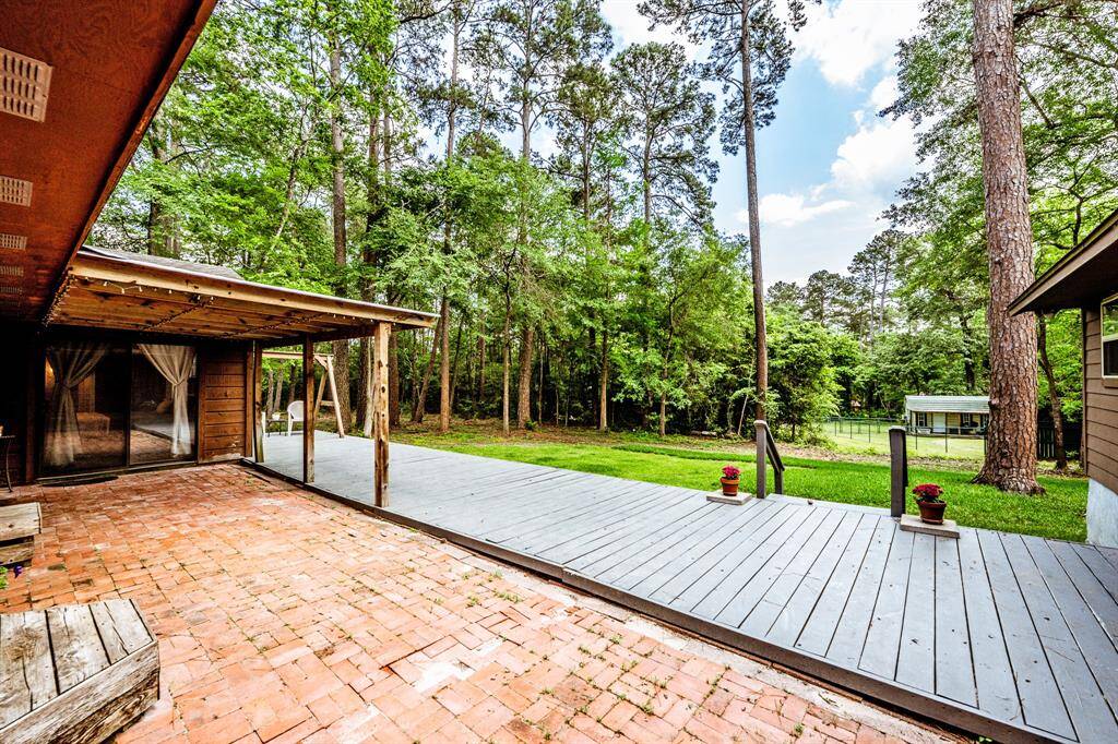 Patio and deck on back of house.