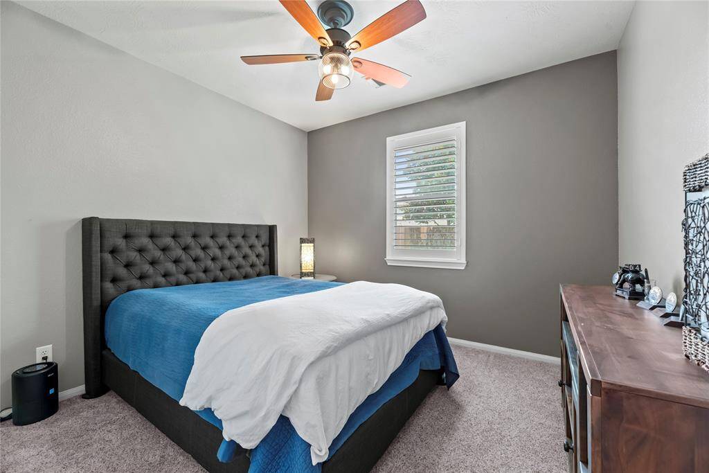 Secondary bedroom with inviting warm colors