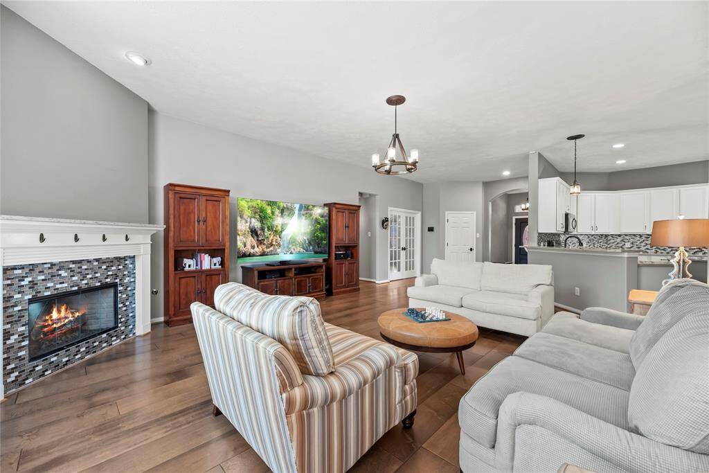 Spacious family room with an open concept design, creating a warm and inviting atmosphere for quality time.