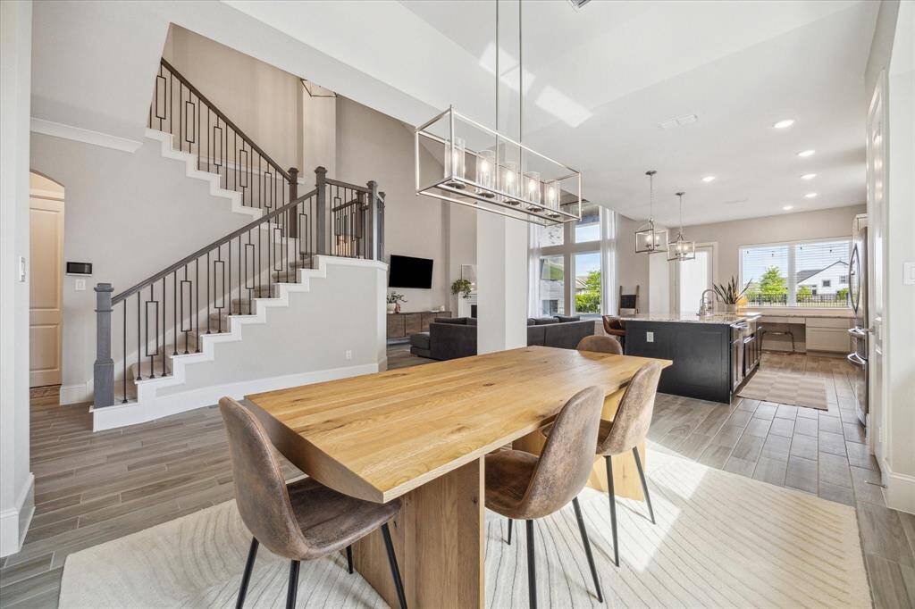 Formal dining is still open to the rest of the floor plan making it great to host.