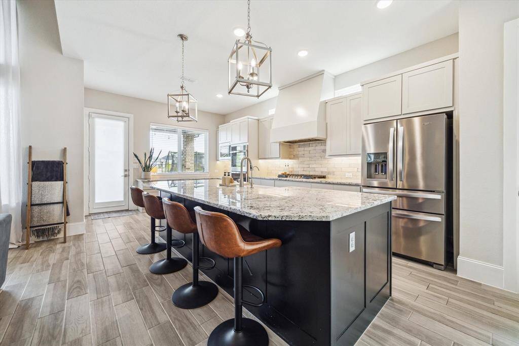 Extra long kitchen island is a chef's dream.