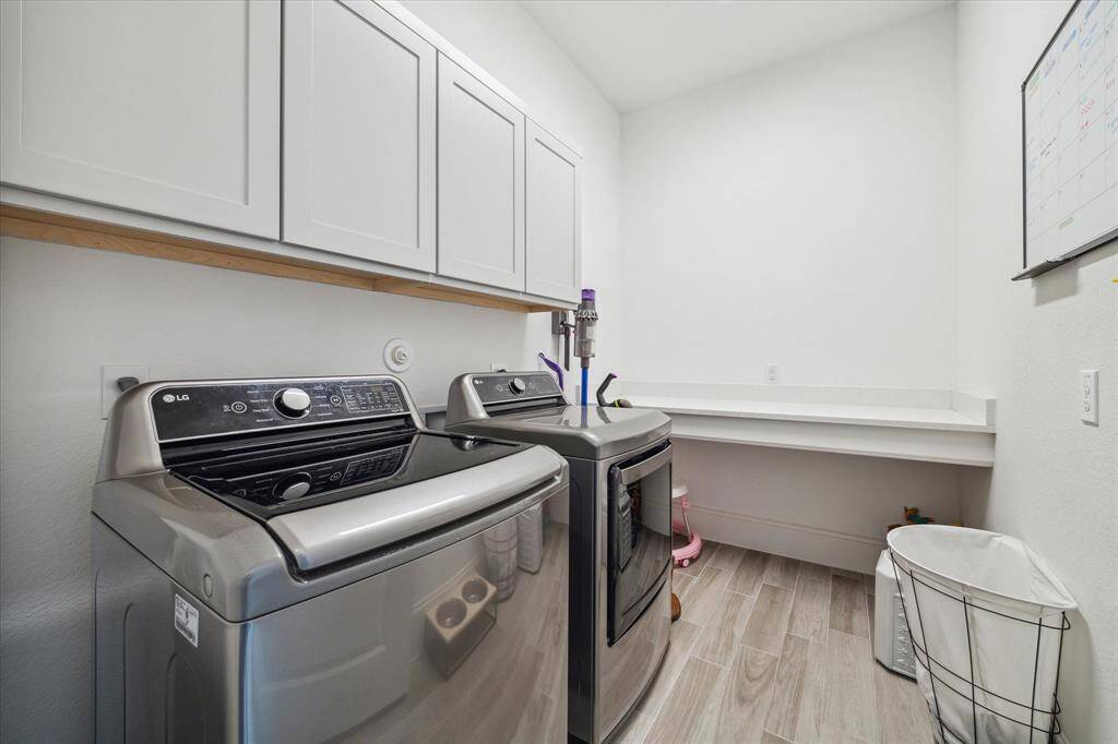 Large utility room on the first floor with folding area.