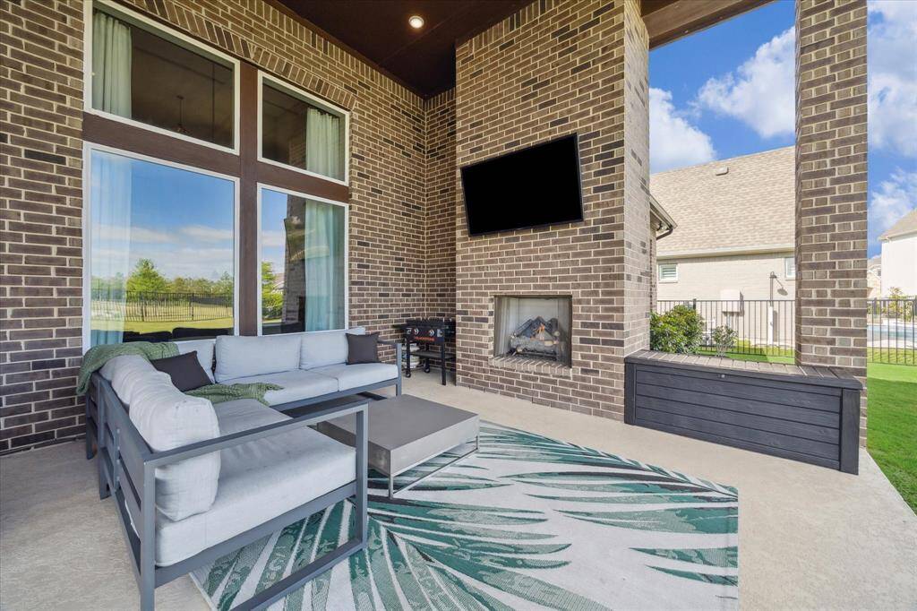 You will love spending your time out here with an outdoor fireplace year round!