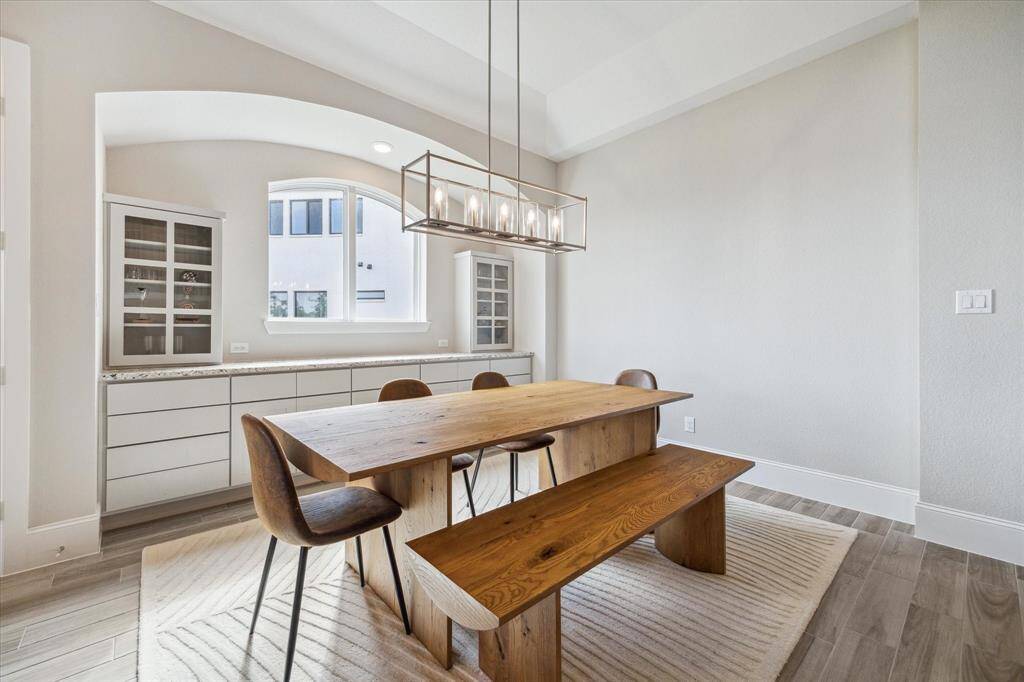 Formal dining room is off the kitchen with a built in buffet.