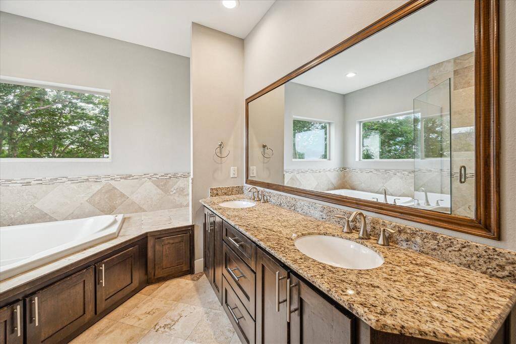Primary bath with double sinks, granite and more