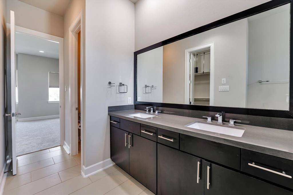 Primary Bath with a long vanity and double sinks