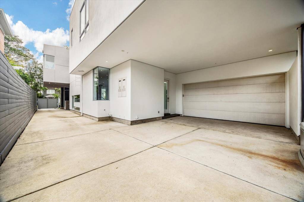 Two car garage and wide driveway