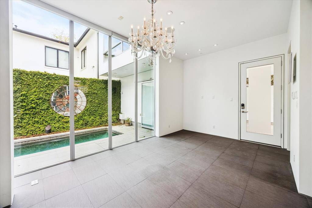 Dining area has beautiful view of pool