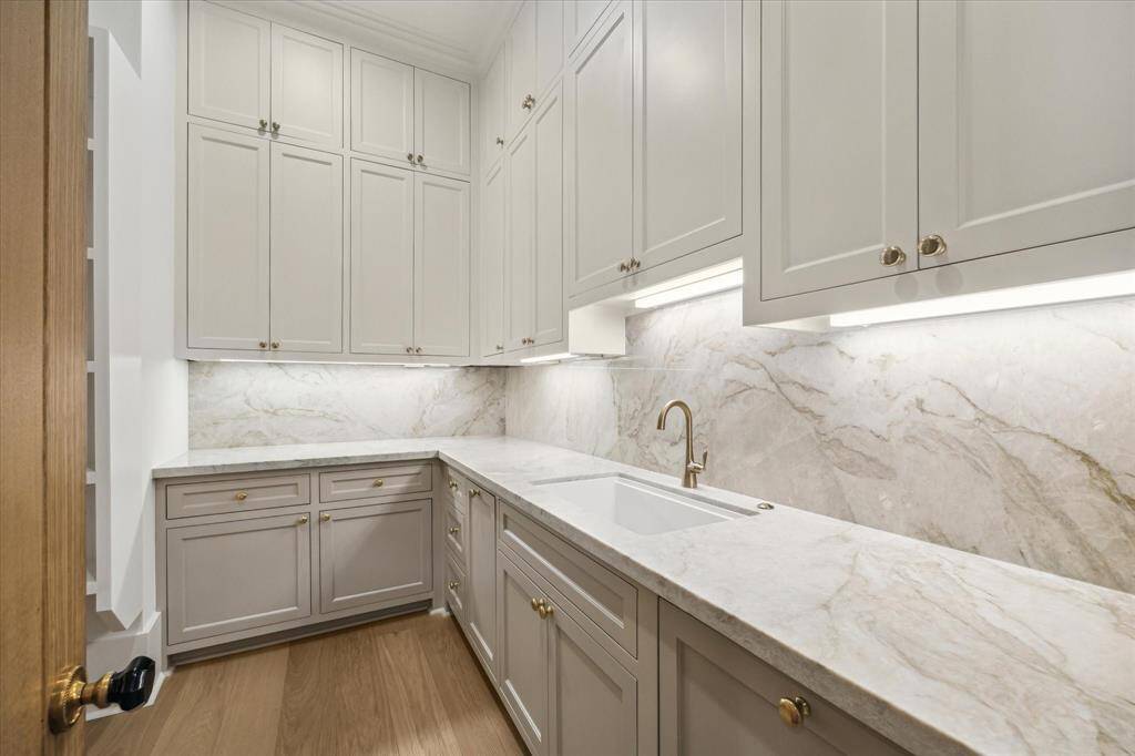 Walk in pantry is truly a scullery - second sink, extra dishwasher, keep all the kitchen prep behind closed doors*Picture is of a recently constructed home by the builder.  1519 Candlelight will be similar in quality, but these pictures are not meant to be an exact representation of the new home. Specs of home may change at sole discretion of the seller.