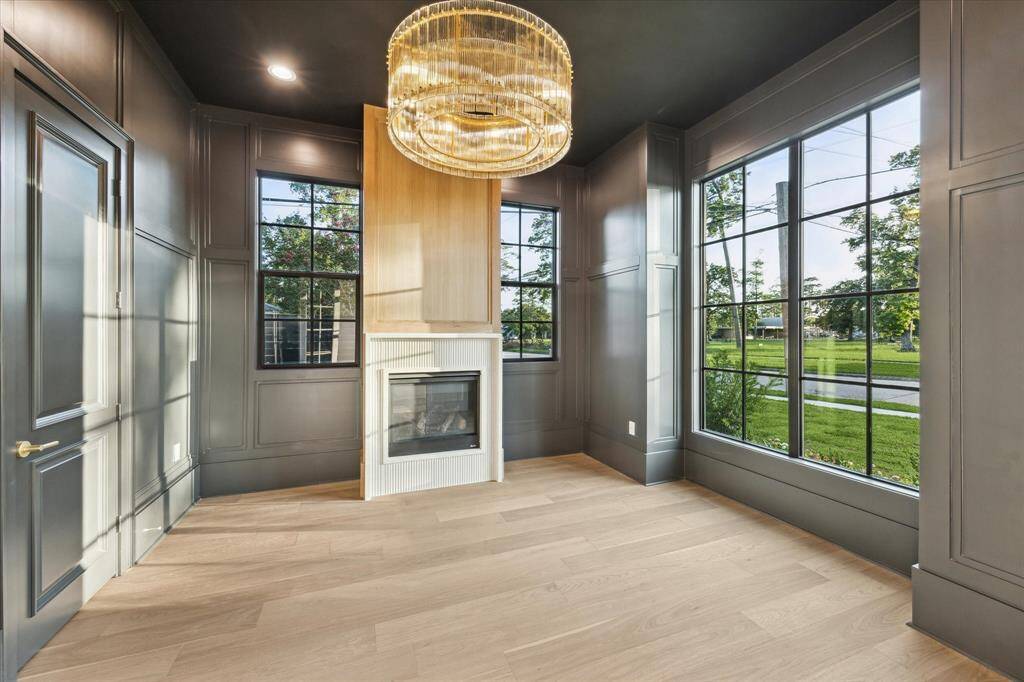 Elegant study with high end trim, fireplace *Picture is of a recently constructed home by the builder. 1519 Candlelight will be similar in quality, but these pictures are not meant to be an exact representation of the new home. Specs of home may change at sole discretion of the seller.