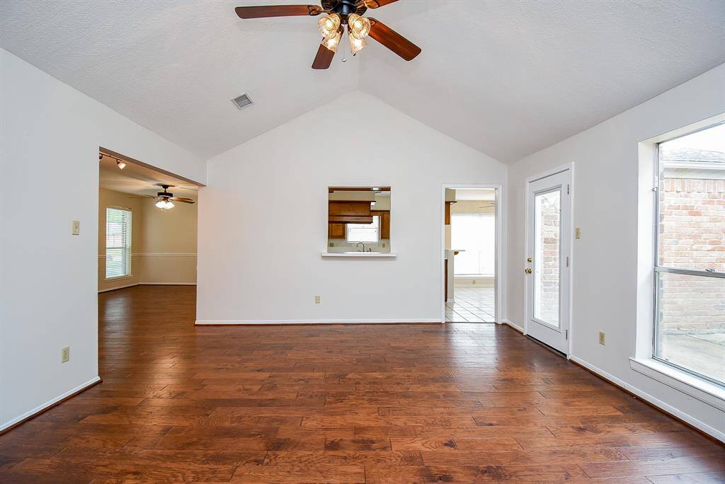Check out this kitchen dining room and outdoor access from this living room!