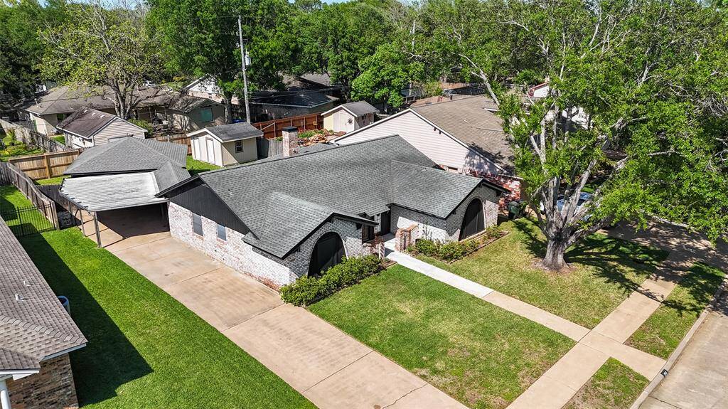 PANORAMIC VIEWS OF THE LOT, GARAGE AND STORAGE SHED.