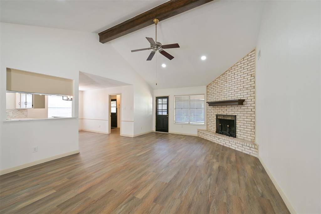 FAMILY ROOM WHICH OPENS UP TO THE DINING/KITCHEN COMBO.