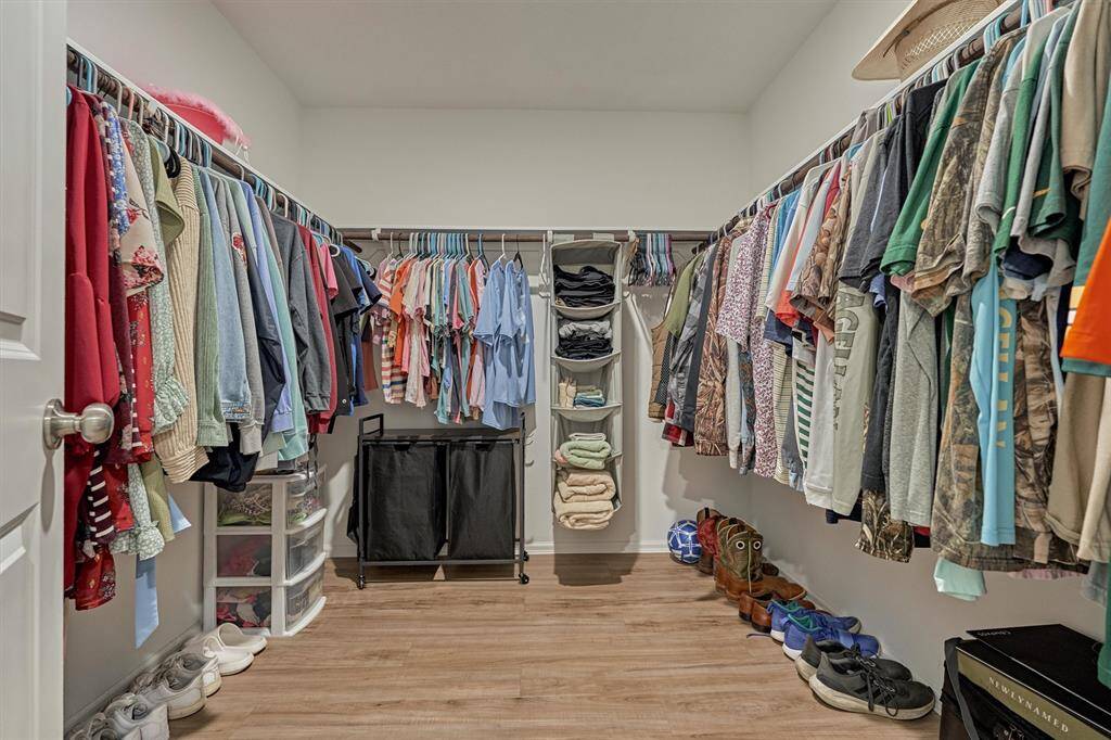 Huge walk in master closet! Plenty of space for storage, clothes, and shoes.