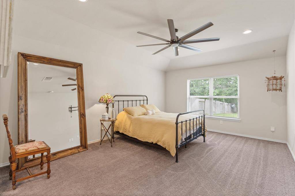 Primary bedroom overlooking the backyard.