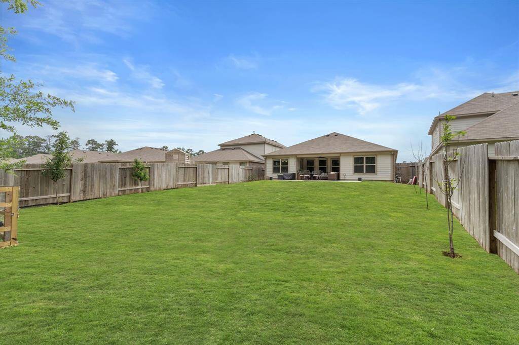 Fully sprinkled backyard.