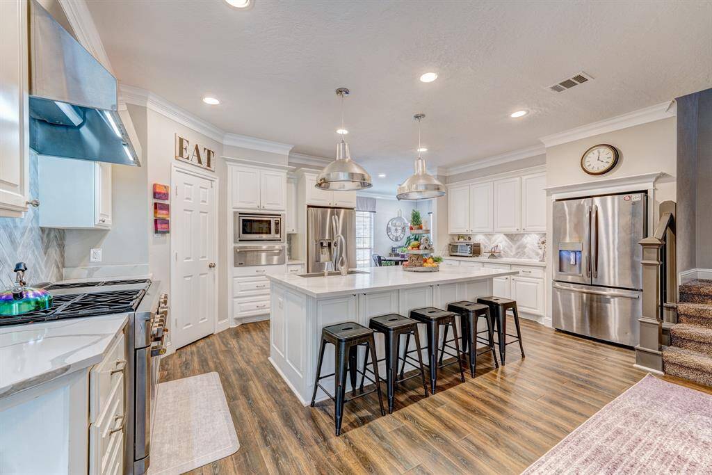 The kitchen has many upgrades.  From 2 refrigerators to 2 dishwashers and even 2 pantries.
