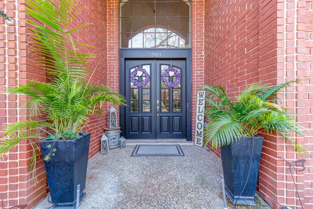 Large covered porch and double doors to greet your guests.