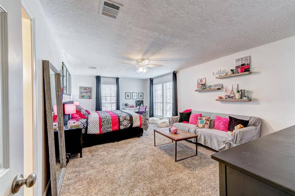Largest of the upstairs rooms.  King bed and a couch!