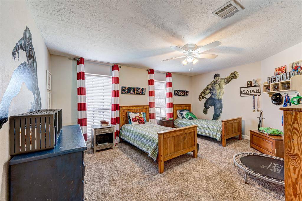 On the other side is the third upstairs bedrooms.