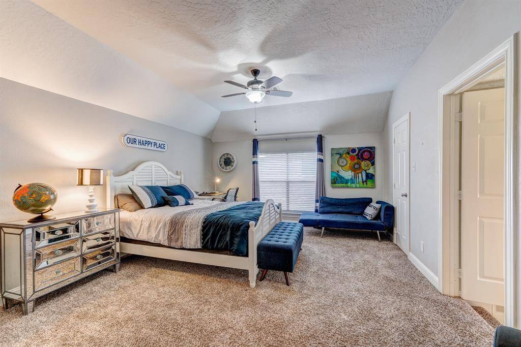 Fourth upstairs bedroom with walk in closet.