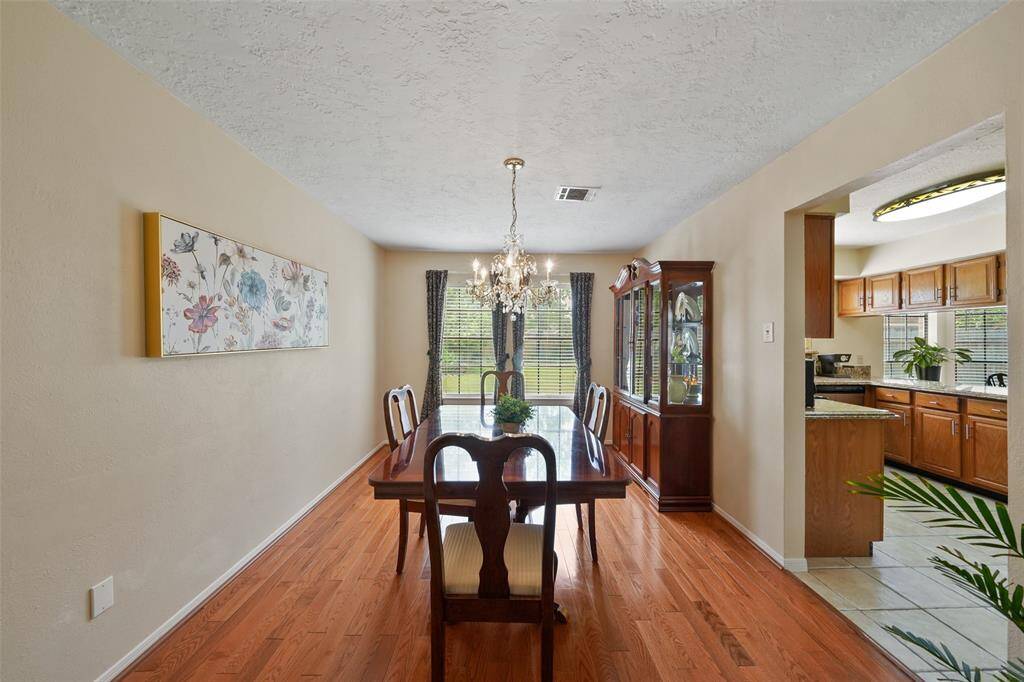 Elegant dining room with seamless kitchen access.