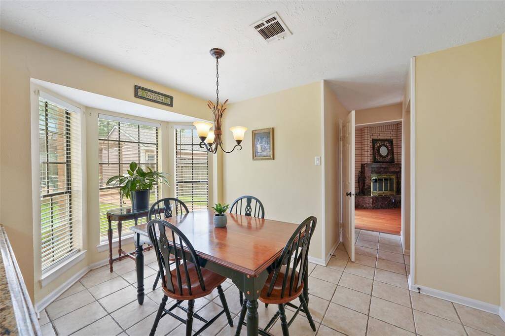 Cozy breakfast room with a seamless view into the inviting family room.