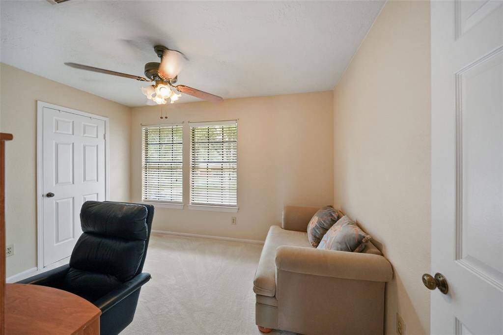 Versatile secondary bedroom currently styled as a home office.
