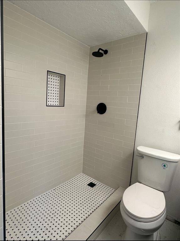 Beautifully re-done primary bathroom shower.